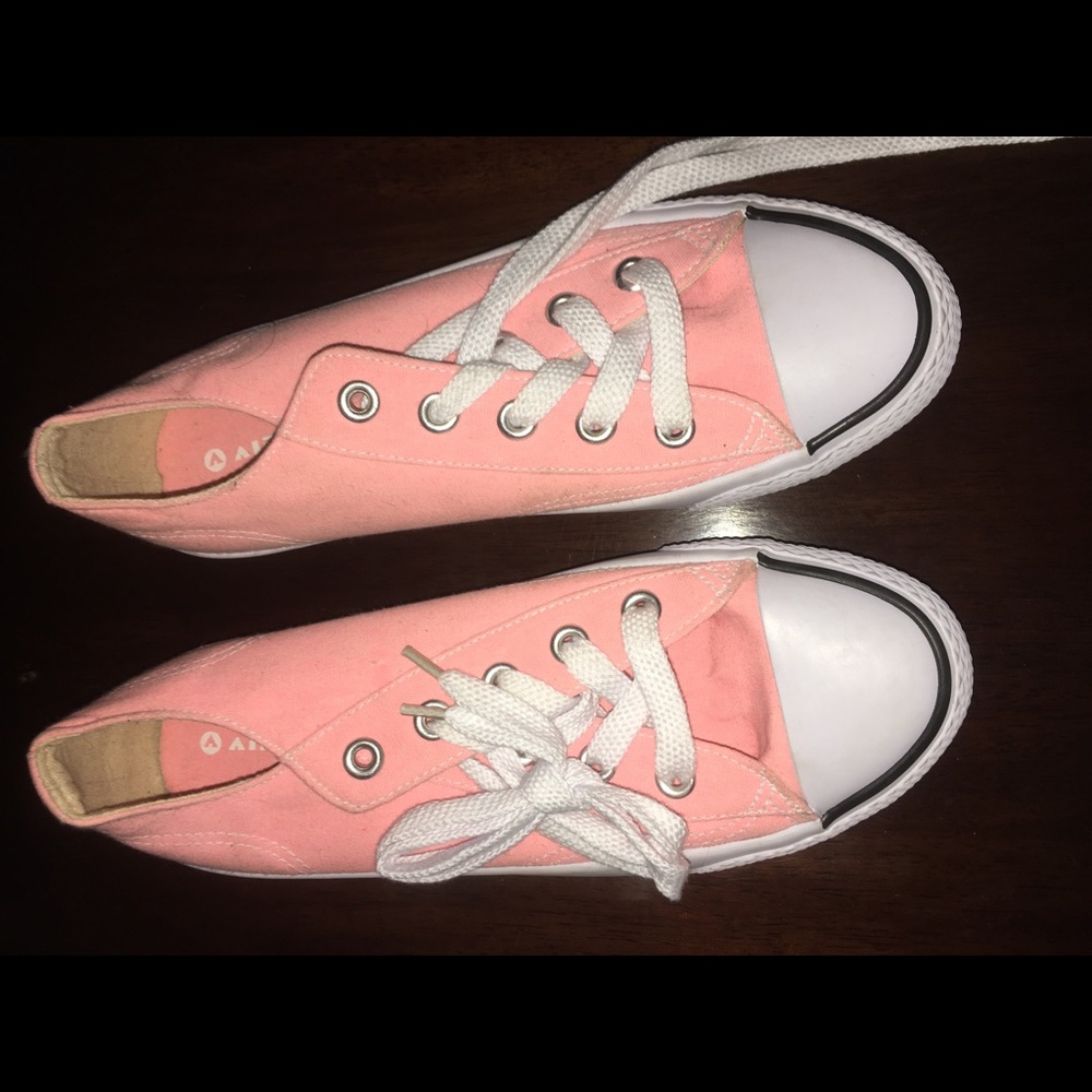 Pink converse type shoes